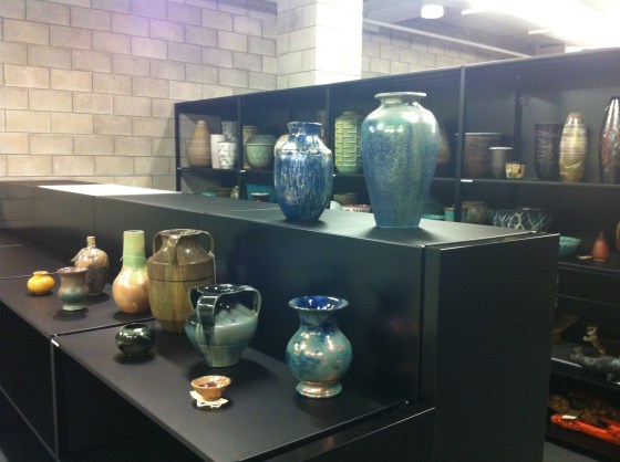 Pewabic Pottery vases and bowls on view in the ceramics vault. Behind the Pewabic Pottery pieces are ceramic works by Maija Grotell.  Shoshana Resnikoff/Cranbrook Art Museum, 2013.