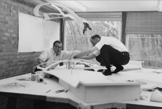 Eero Saarinen and Kevin Roche work on the TWA terminal model. 1957, Claude DeForest Papers, Cranbrook Archives.