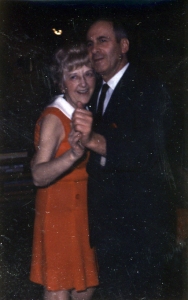 Sara and Melvyn Smith dance together in Smith House.