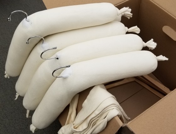 Assembled padded hangers.
