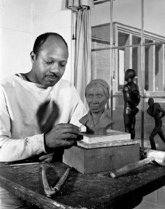 Oliver LaGrone in his studio at Cranbrook Academy of Art circa 1942 with a model of his bust of Harriet Tubman. Courtesy Cranbrook Archives.
