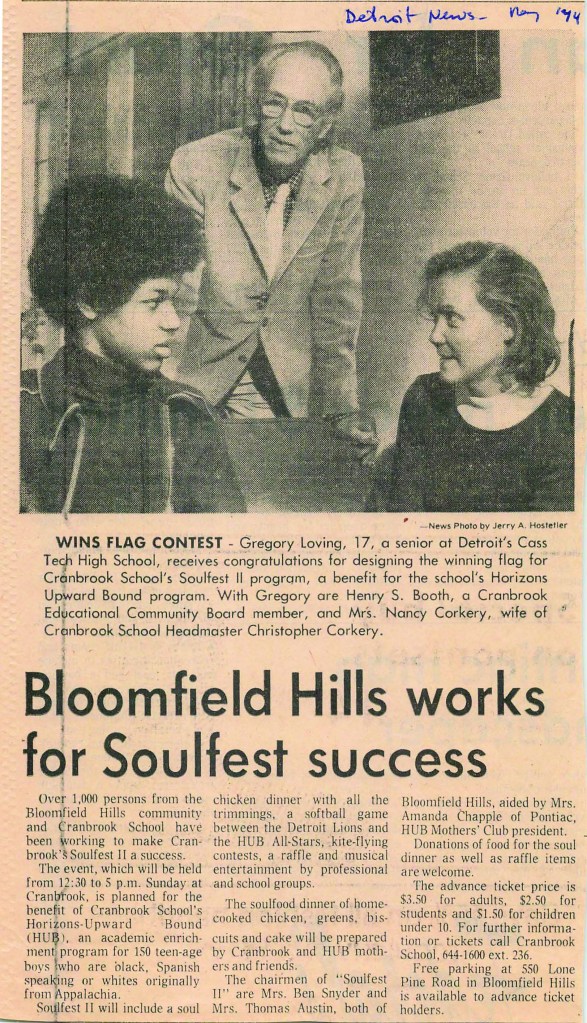 news clipping featuring a student with afro sitting with two administrators