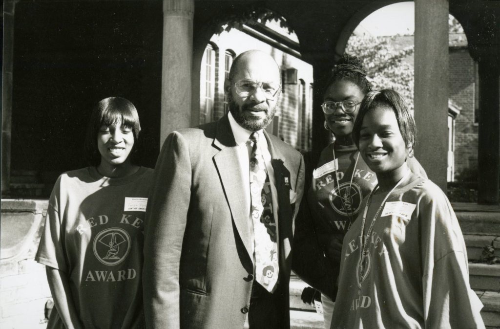 Grayscale photo with students and Mayor Dennis Archer